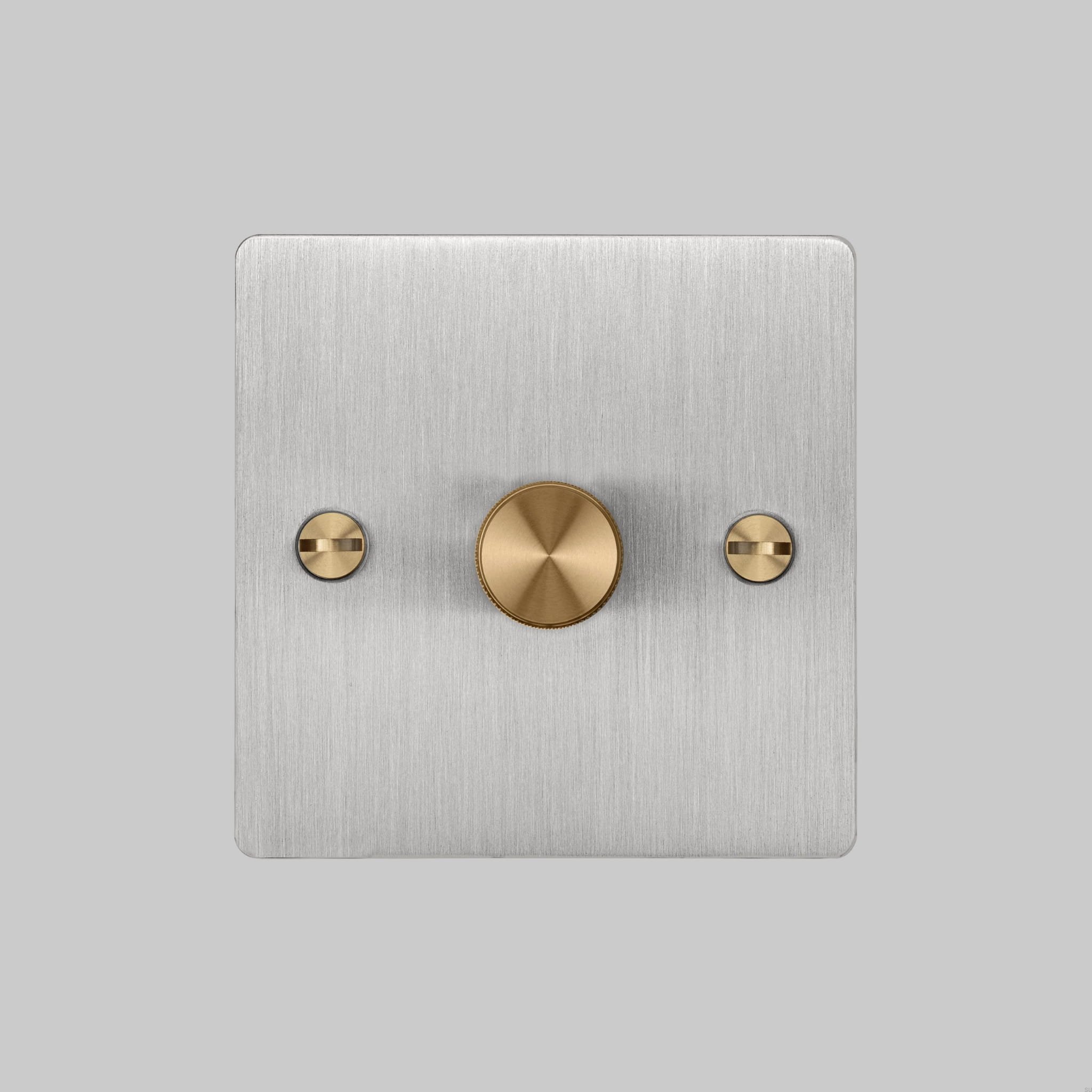 2.-BusterPunch_1G_Dimmer_Front_Steel_Brass-scaled.jpg