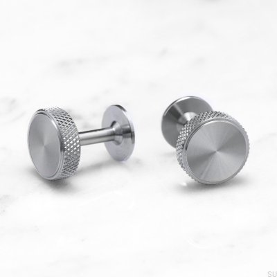 Gemelos de plata y acero con forma de cruz