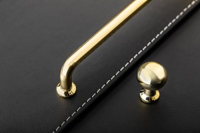 Tirador para mueble alargado Nord 128 Oro Pulido