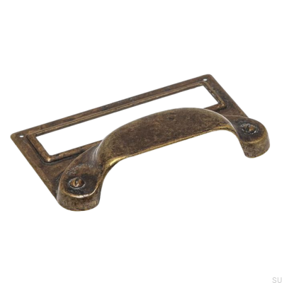 Un tirador de mueble de concha con la etiqueta Antique Bronze