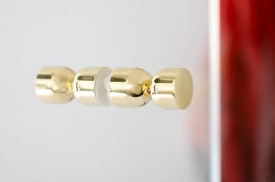 Kokeshi 1832 Pomo para mueble de doble cara, latón pulido, sin barnizar