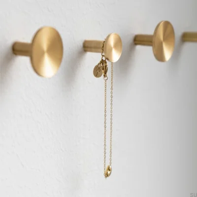 Colgador de pared Sture 18, latón cepillado sin lacar