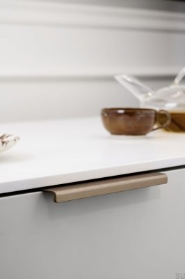 Tirador para mueble Artisan 160 edge, aluminio cepillado dorado