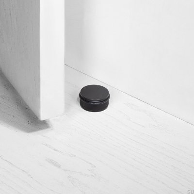 Tope de puerta de piso negro de acero cruzado