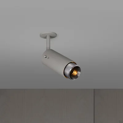 Lámpara de punto ajustable con forma de cruz de escape en color gris acero con acabado plateado