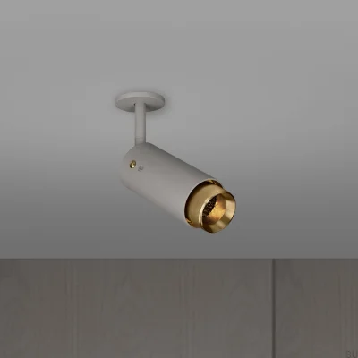 Lámpara de escape lineal ajustable de acero gris con latón