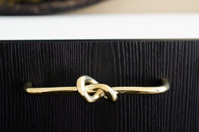 Tirador alargado para muebles Knot 128, latón pulido